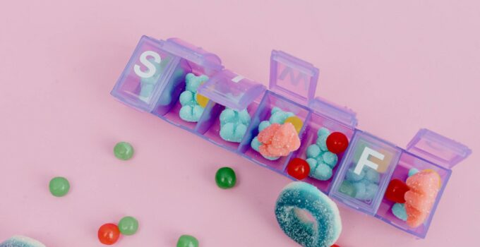 A Variety of Candies in a Pill Organizer