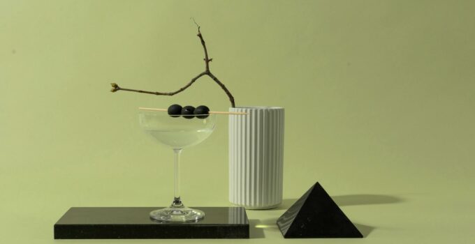 Martini Glass with Black Olives on Marble Tray