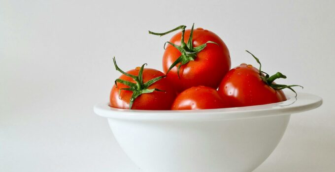 Red Tomatoes in White Bowl