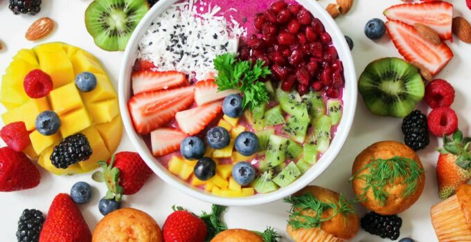 Assorted Sliced Fruits in White Ceramic Bowl