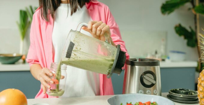 Woman Makes Green Smoothie