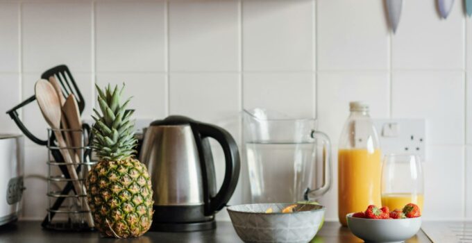 Kitchen table with fruits and juice