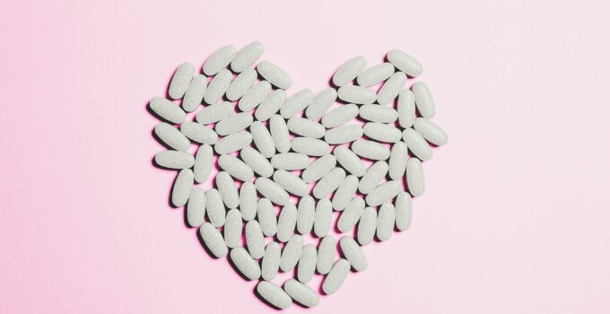 Blue Medicine Pills on Heart Shape