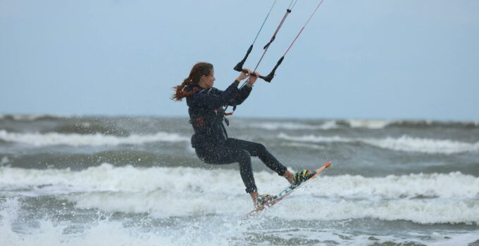 A Woman Enjoys Kite Boarding